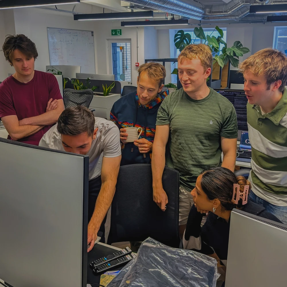 Prax engineers collaborating in the London office